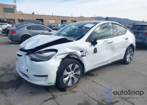 2022 Tesla Model Y Long Range Dual Motor All-Wheel Drive z USA, uszkodzony, nr VIN 7SAYGDEE0NF544844